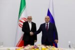 دیدار عارف با نخست‌وزیر روسیه در حاشیه نشست اوراسیا
